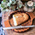 Vagabond House Harvest Round Bread Board with Pewter Wheat Knife