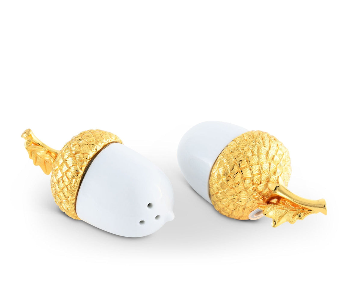 https://www.vagabondhouse.com/cdn/shop/products/vagabond-house-majestic-forest-porcelain-salt-and-pepper-acorn-gold-leaf-l116lag-31279353036848_1200x.jpg?v=1678084651